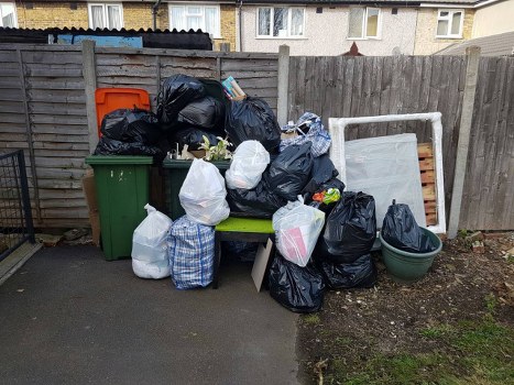 Team clearing garage in South Hackney