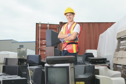 Professional team clearing garage items