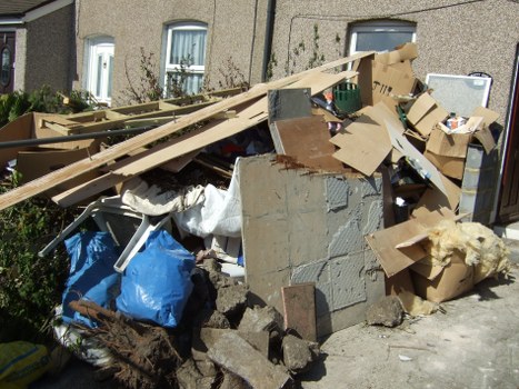 Family assessing items for garage clearance